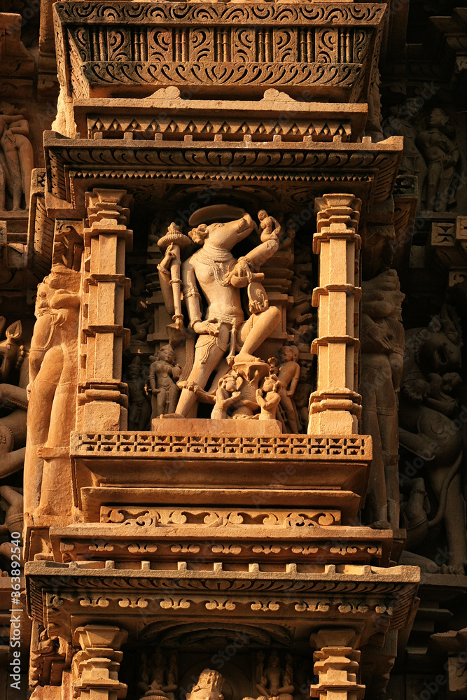 Close up of artful carved walls, Ancient reliefs at famous erotic temple in Khajuraho, Madhya Pradesh, India.