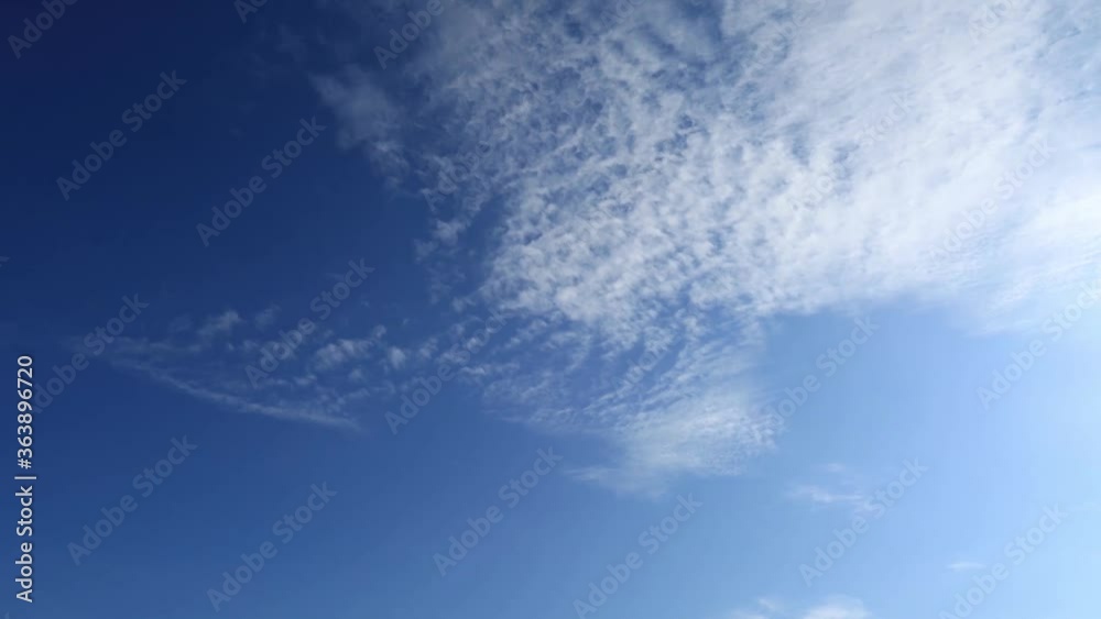 B-Roll TimeLapse vdo of beautiful bright sunrise clouds & cumulus or cirrocumulus cloudscape on sunny clear blue sky background in tropical summer or spring morning sunlight & sun rays at sunshine day B-Roll TimeLapse vdo of beautiful bright sunrise clouds & cumulus or cirrocumulus cloudscape on sunny clear blue sky background in tropical summer or spring morning sunlight & sun rays at sunshine day