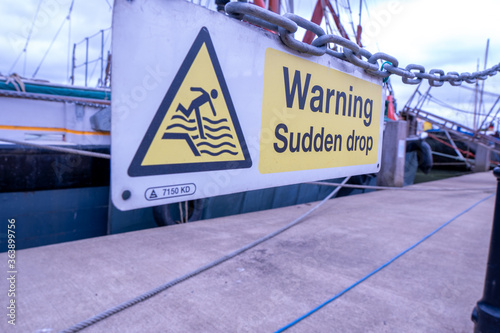warning sign on the bridge