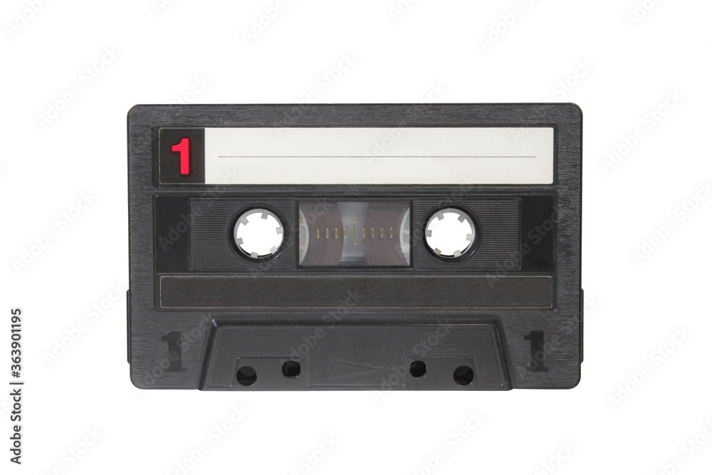 Black cassette isolated on white background. Audio tape macro photo