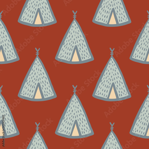 Geometric teepee seamless pattern on red background. Tribal wallpaper.