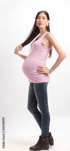 nine months pregnant on white background.