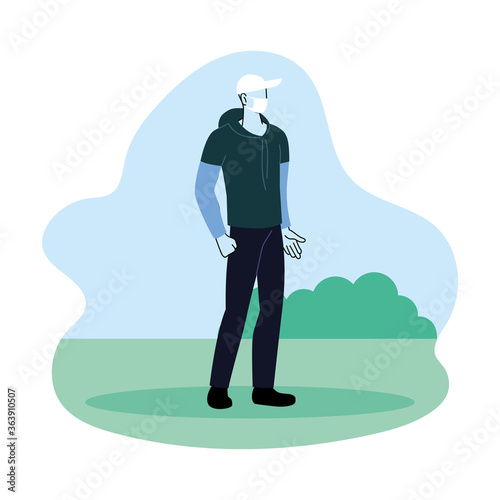young man with mask in the park