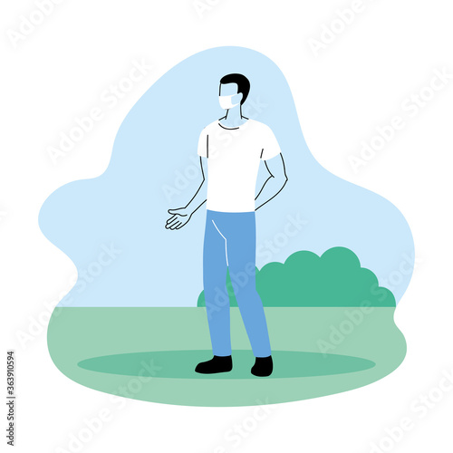 young man with mask in the park