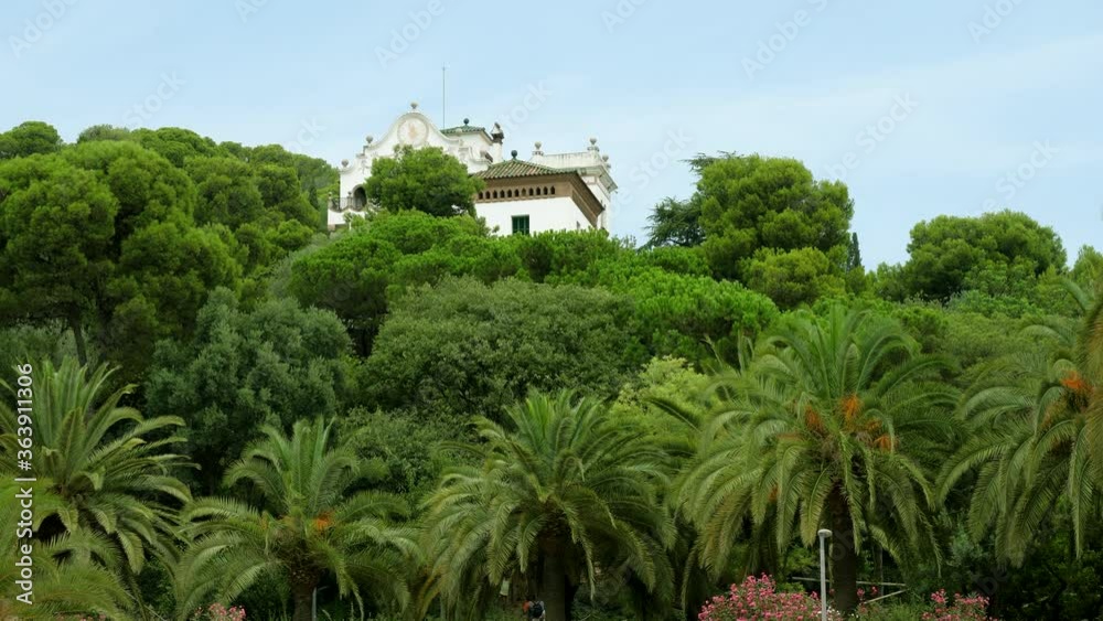 Exterior view of beautiful house surrounded by tropical trees in Spain. 4K Exterior view of beautiful house surrounded by tropical trees in Spain. 4K