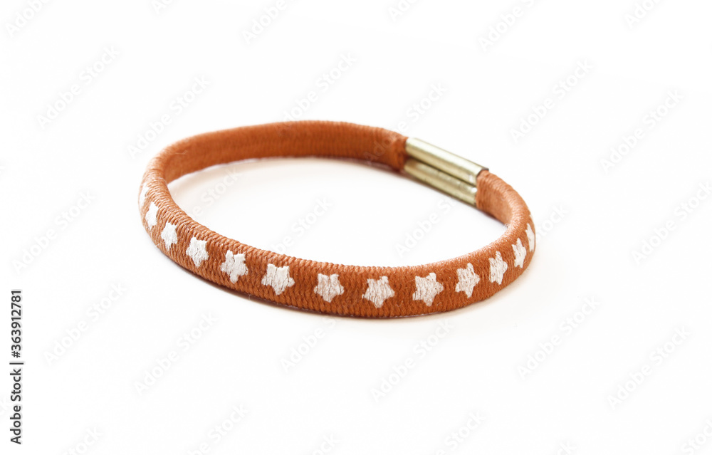 Brown hair rubber band isolated on white background. Brown hair rubber band isolated on white background.