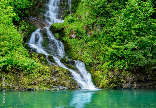 Beautiful waterfall in the rocky mountains. Carpathians.