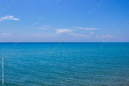 Wallpaper Mural Views of the sea from the beach, the sea is azure blue, as is the sky. Copy space. Torontodigital.ca