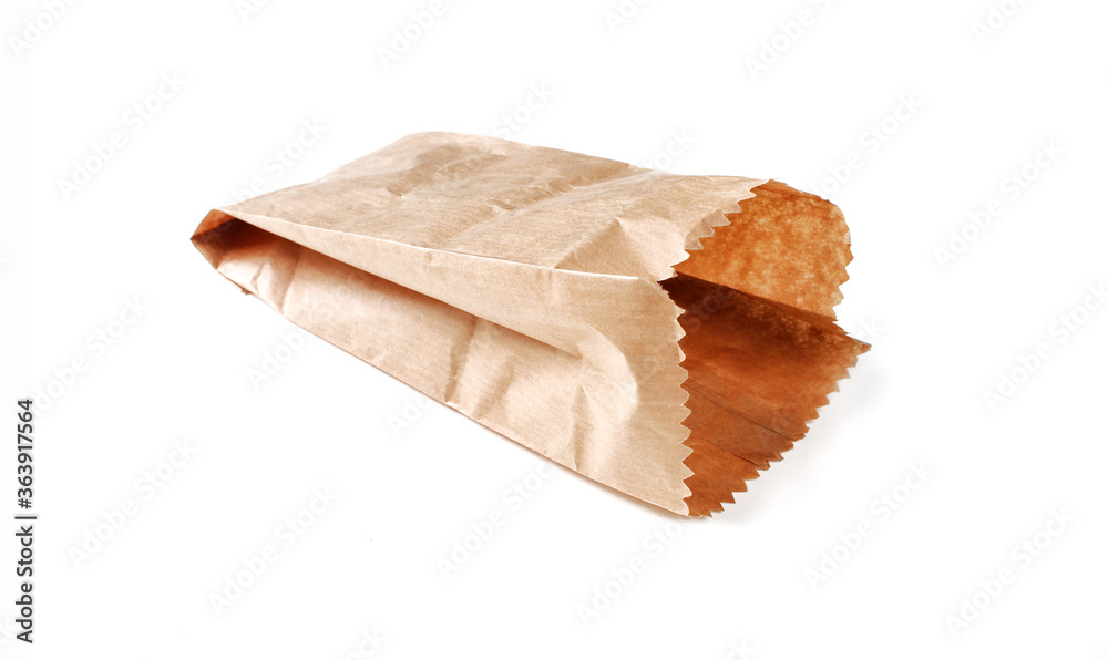 Recycled and wrinkly craft paper bag on white background. Grocery bag isolated Recycled and wrinkly craft paper bag on white background. Grocery bag isolated