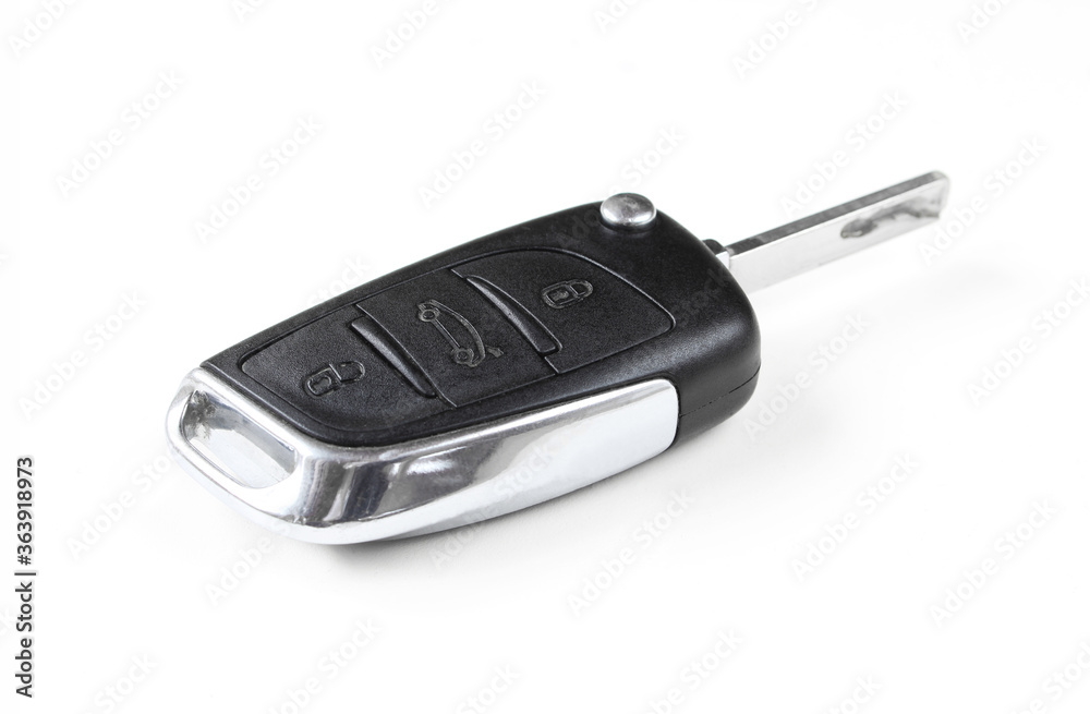 Car key isolated on white background. 
Made of Silver and plastic
