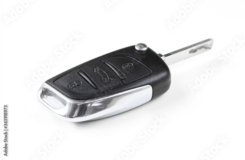 Car key isolated on white background. Made of Silver and plastic