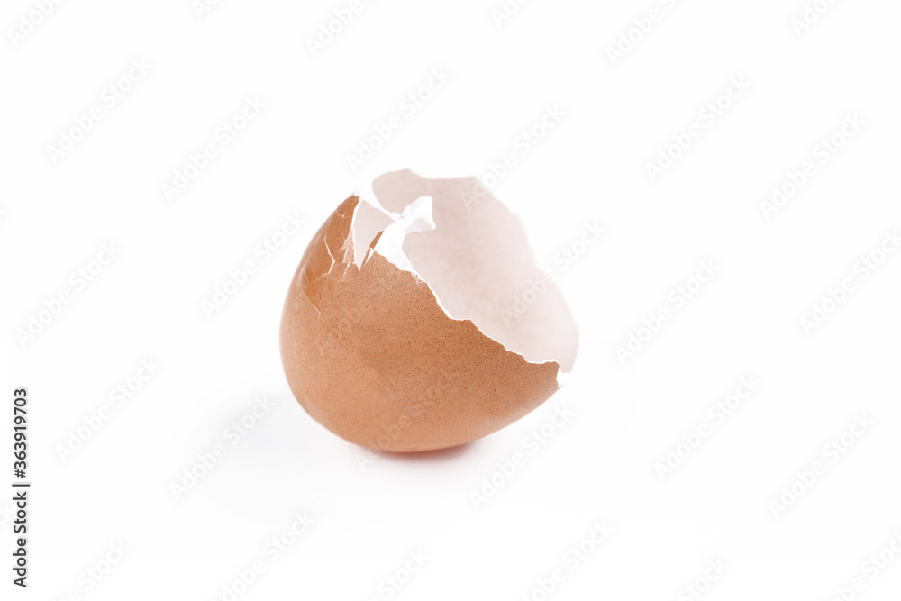 Cracked egg shell isolated on white background. Half of the eggshell Cracked egg shell isolated on white background. Half of the eggshell