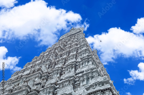 Beautiful view of gopura in the Hindu Arunachalesvara Temple, Tamil Nadu, South India. Amazing blue sky background at Hindu Temple. Great Hindu architecture. photo