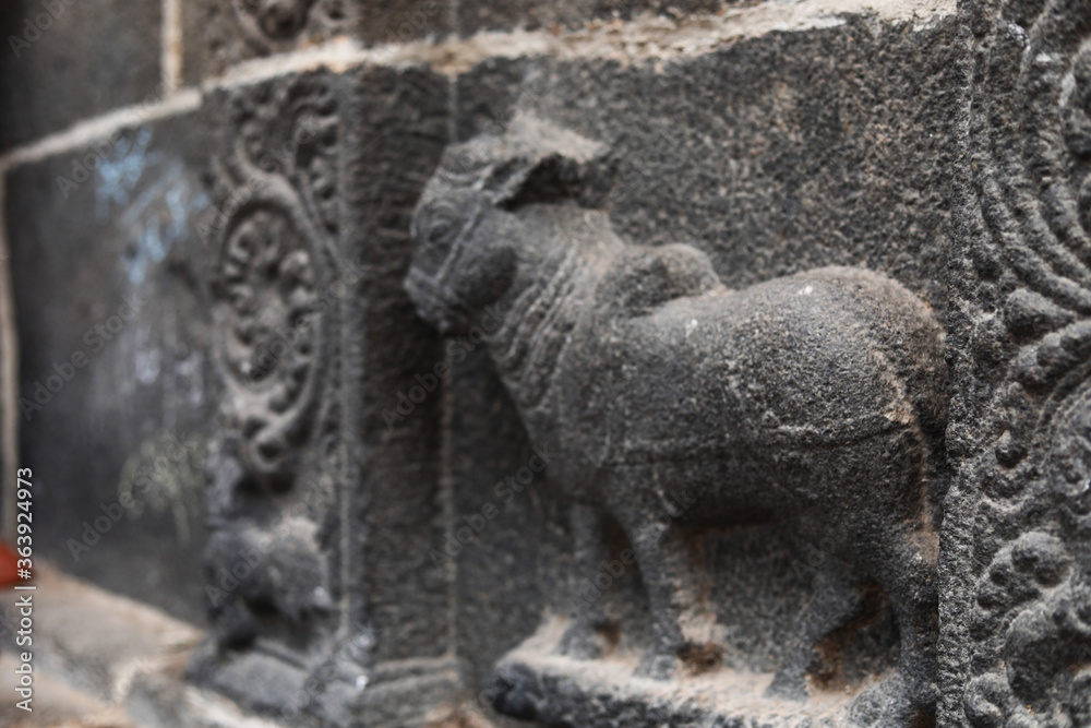 Carving on the walls of an ancient temple. Great South Indian architecture