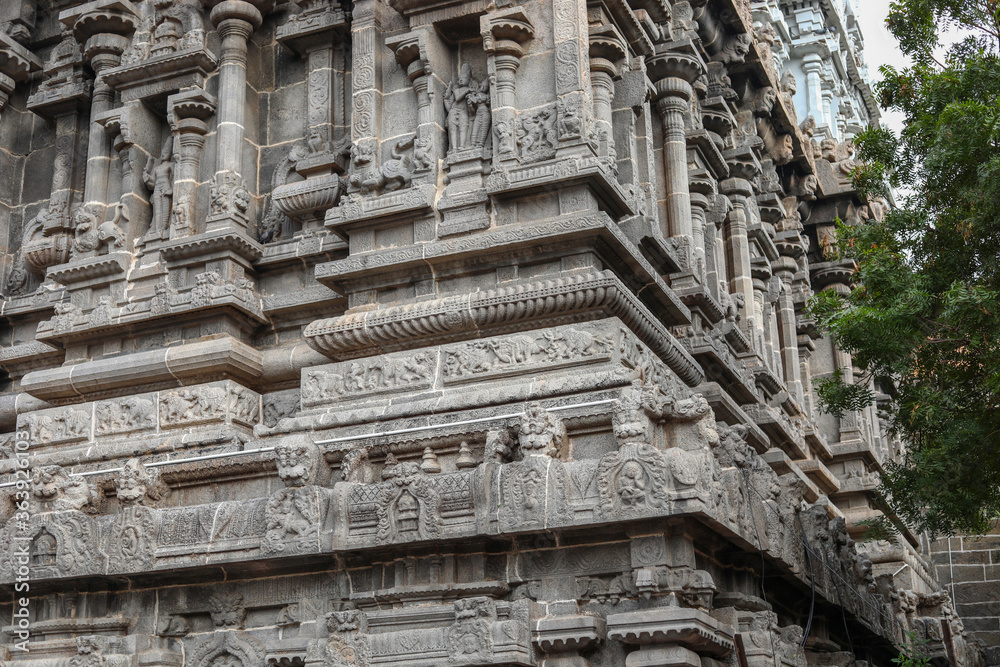 Carving on the walls of an ancient temple. Great South Indian architecture