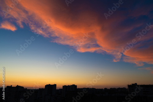 Beautiful sunrise sky over the city in Moscow, Russia © olgavolodina