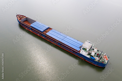 River barge for transportation of goods, top view © evgenii