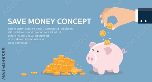 Hand putting coin a piggy bank money savings.