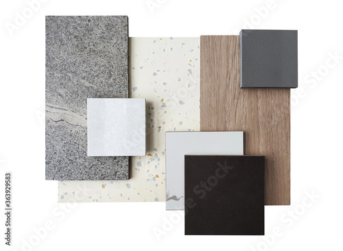 top view of matching interior material  contains white terrazzo ,grey stone tile ,square marbles ,square synthesis stones and wooden veneer samples isolated on white background with clipping path.