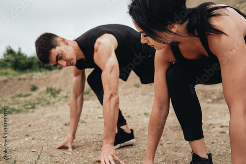 Two Athletes in Black Sportswear Training Together Open Air, Healthy Lifestyle and Outdoors Workout Concept
