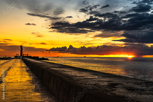 sunset on the pie in Baltic Sea