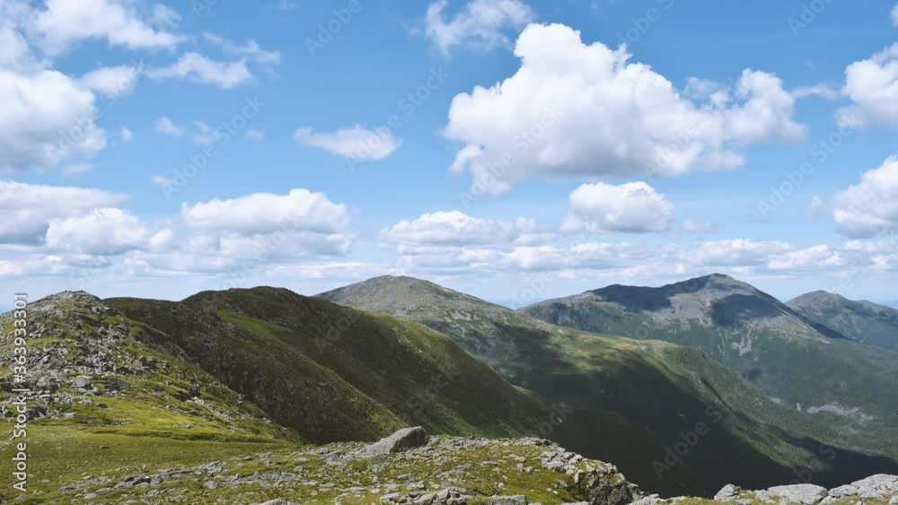 Landscape time lapse of clouds over the presidential mountain range in summer.
