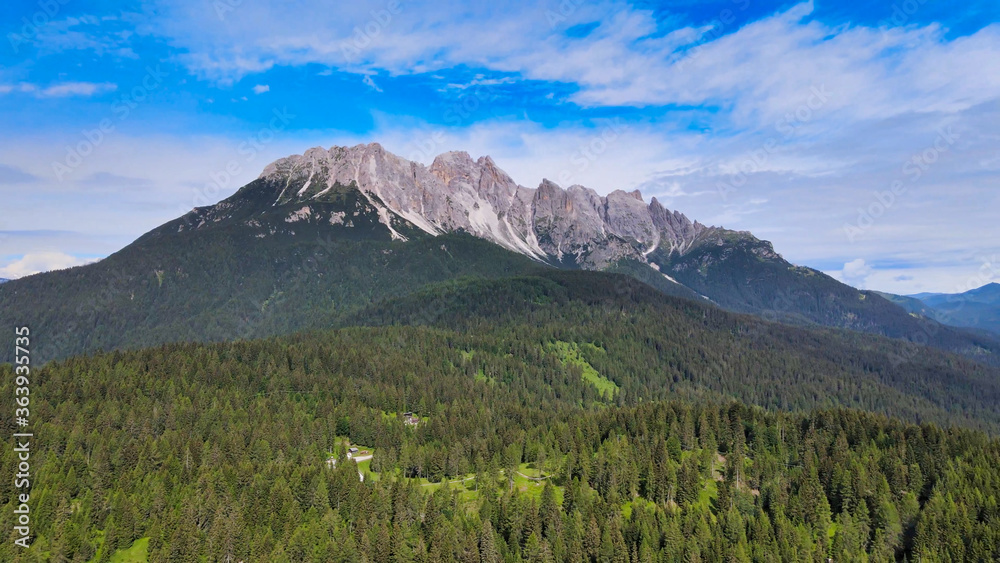 Alpin landscape with beautiful mountains in summertime, view from drone