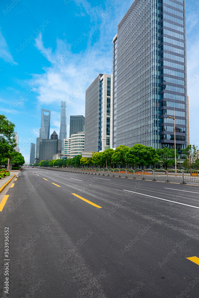highway transportation and the high-rise building unde in the blue sky.