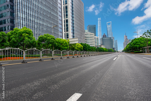 highway transportation and the high-rise building unde in the blue sky.