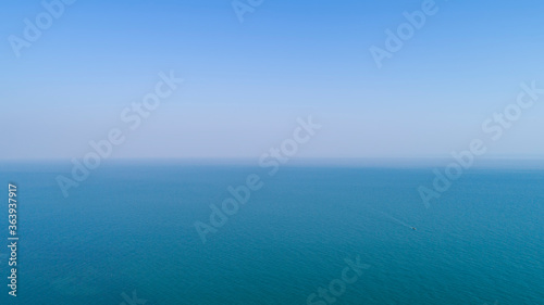 Wallpaper Mural A small boat was sailing on the sea and the blue sky Torontodigital.ca