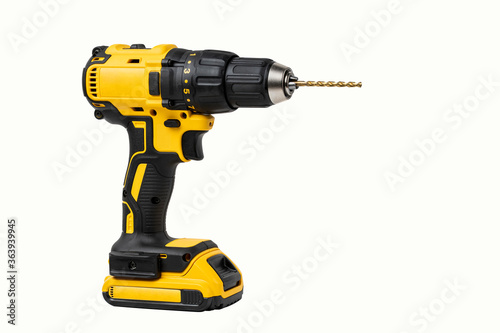 Obraz na płótnie Power drill or Cordless screwdriver with battery isolated on white background with clipping path w salonie