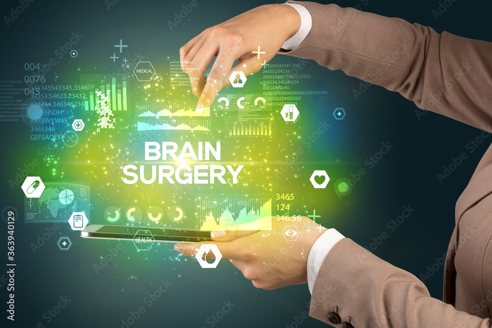 Close-up of a touchscreen with BRAIN SURGERY inscription, medical concept Close-up of a touchscreen with BRAIN SURGERY inscription, medical concept
