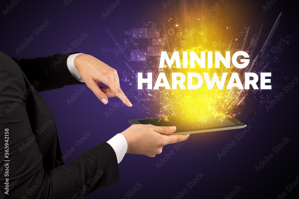 Close-up of a touchscreen with MINING HARDWARE inscription, innovative technology concept