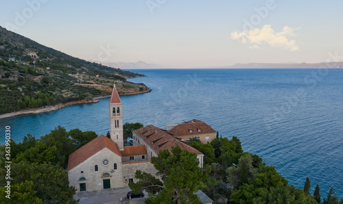 The small church of St.Ivan and Teodor next to the sea on island Brac Bol photo
