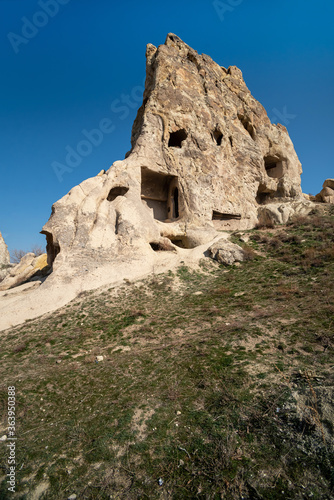 Houses built on the rocks of the Goreme Valley. Cappadocia, Turkey.