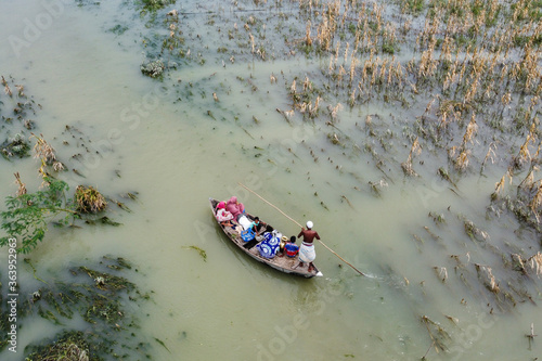 Fotografía Aerial view farmlands submerged in flood water.