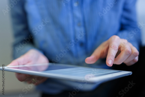 woman using tablet computer