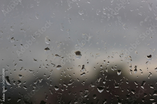 Rain Drops on Window Glass in a Day