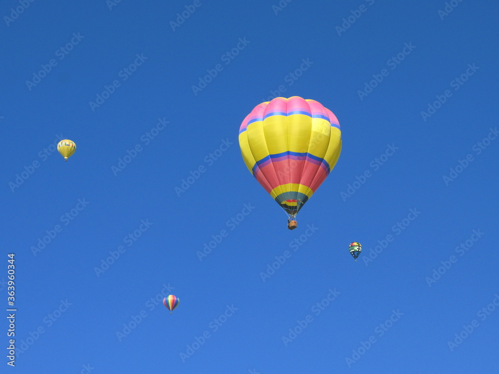 Naklejka premium Colorful hot air balloons on the blue sky, Albuquerque International Balloon Fiesta, USA