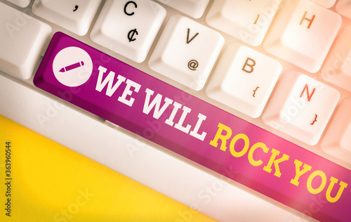 Text sign showing We Will Rock You. Business photo text to be going out and facing the world and all that is in it Different colored keyboard key with accessories arranged on empty copy space