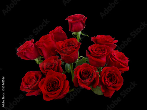 bouquet of red roses with green foliage
