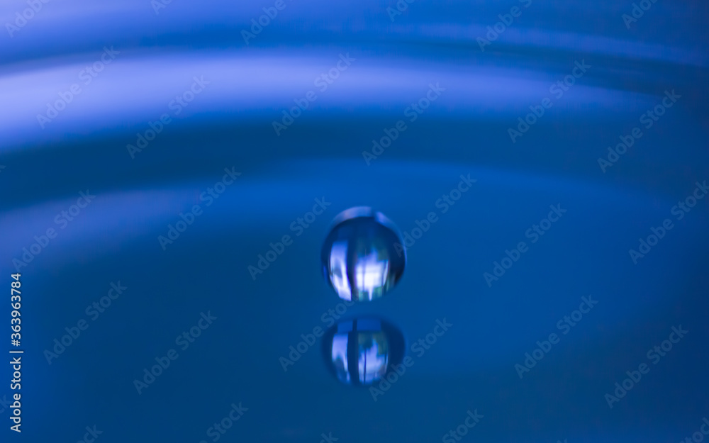 Blue Color water drop and splash