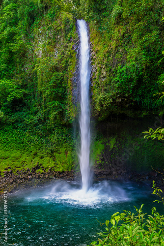 La Fortuna Waterfall in a forest, close to Arenal Volcano, Costa Rica national park. Central America.