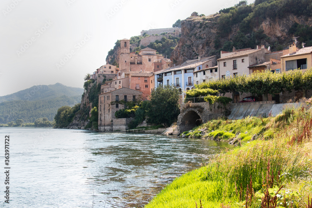 traditional mountain village washed by a river in Spain