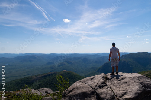 Young man admiring the view in the Grands-Jardins national park, Canada © jonas