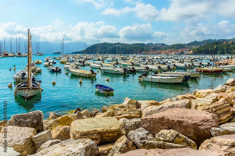 Fototapeta premium A view from the shore out into the Bay of Poets at Lerici, Italy in the summertime
