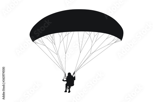 Silhouette of parachutist on parachute high in the sky for skydiving and paragliding extreme sports adventure, a paraglider with parachute as wings on air