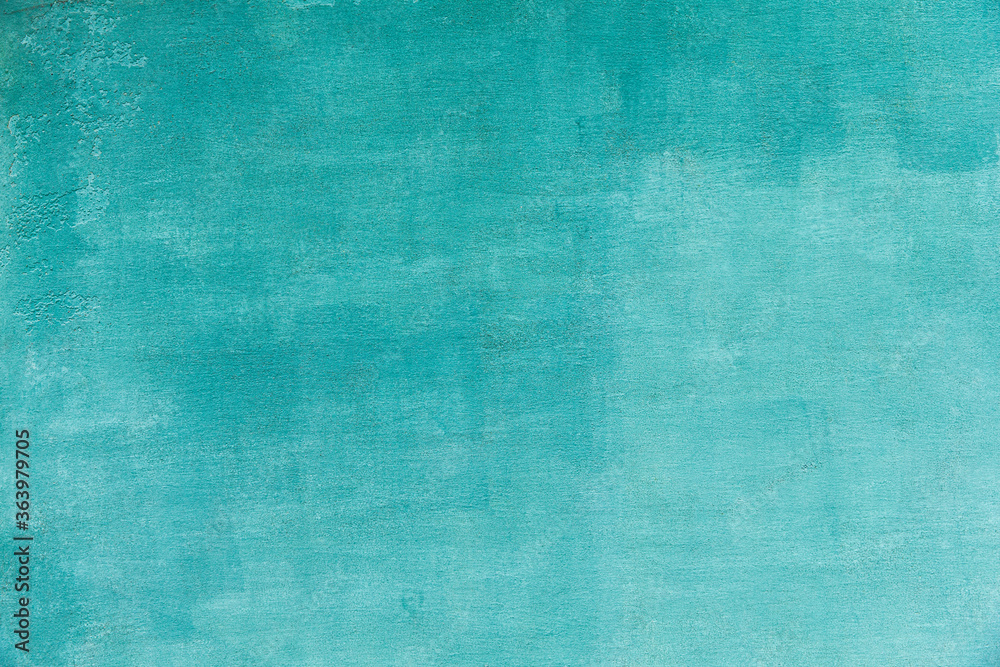 Turquoise uneven painted textured background.