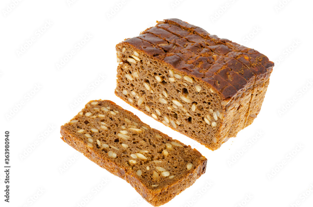 Slices of brown rye bread with sunflower seeds isolated on white background. Slices of brown rye bread with sunflower seeds isolated on white background.