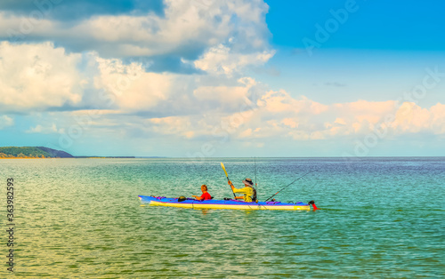 People Kayaking and canoeing in pristine and turquoise water at portuguese Island near Maputo Mozambique